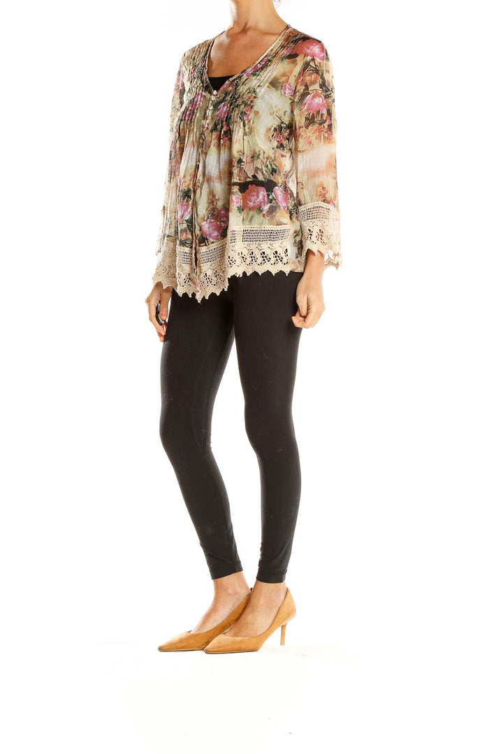 Front view of Adiva beige floral blouse with lace trim and pintuck details