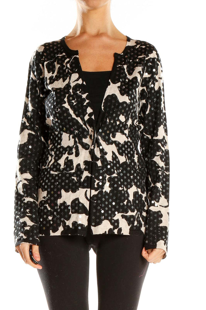 Front view of I.N.C black and white floral print knit cardigan with open front
