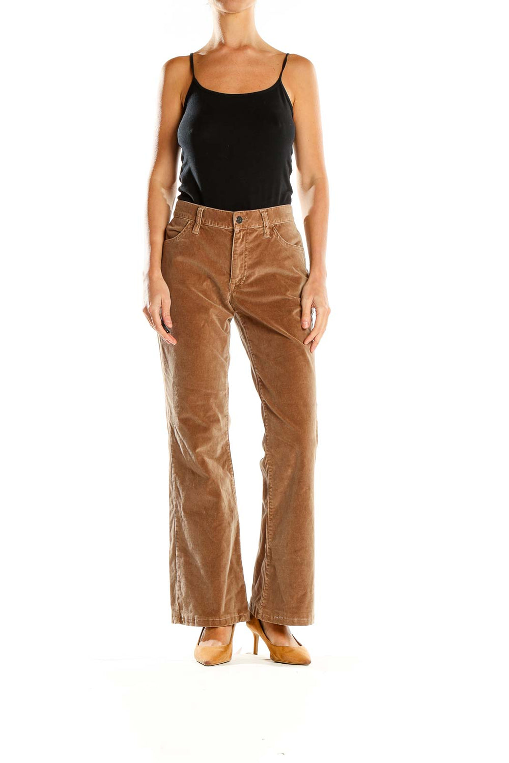Front view of tan Gap corduroy flare pants on model