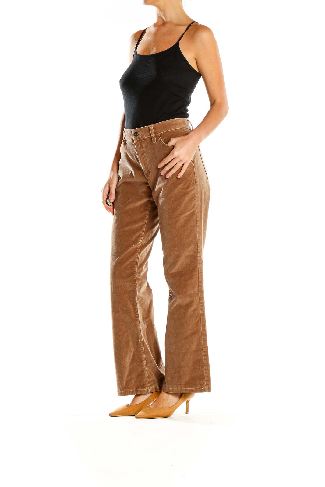 Front view of tan Gap corduroy flare pants on model