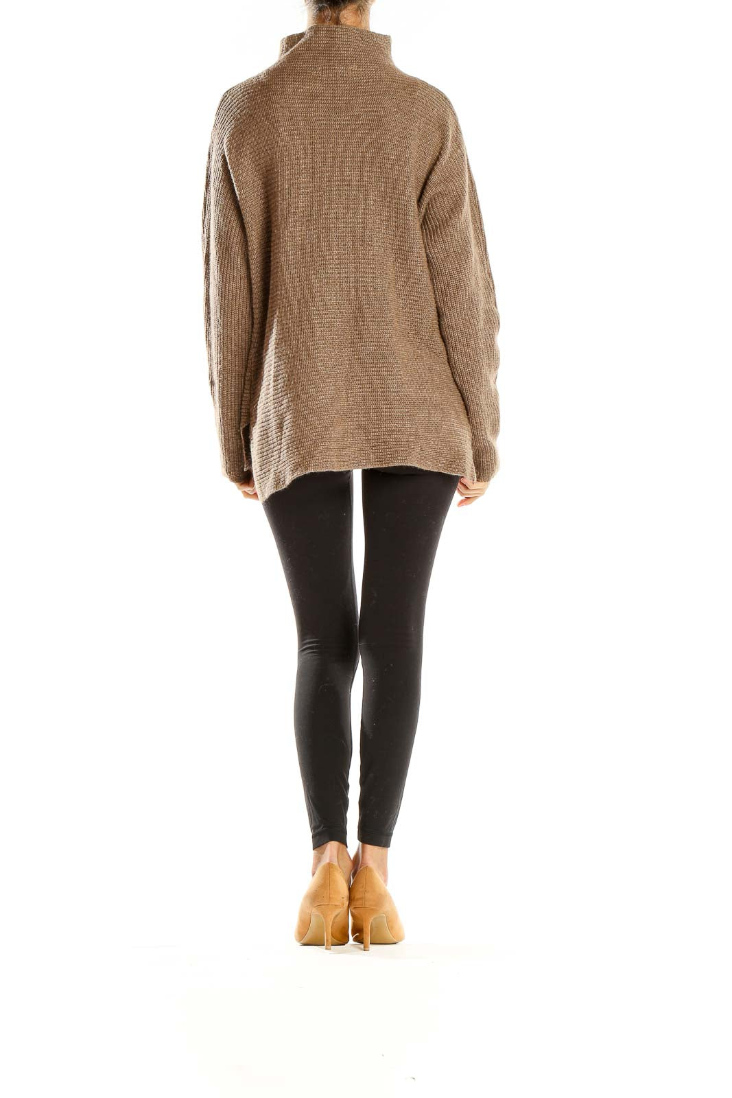 Side view of brown ribbed turtleneck sweater by Bartolini worn with black leggings