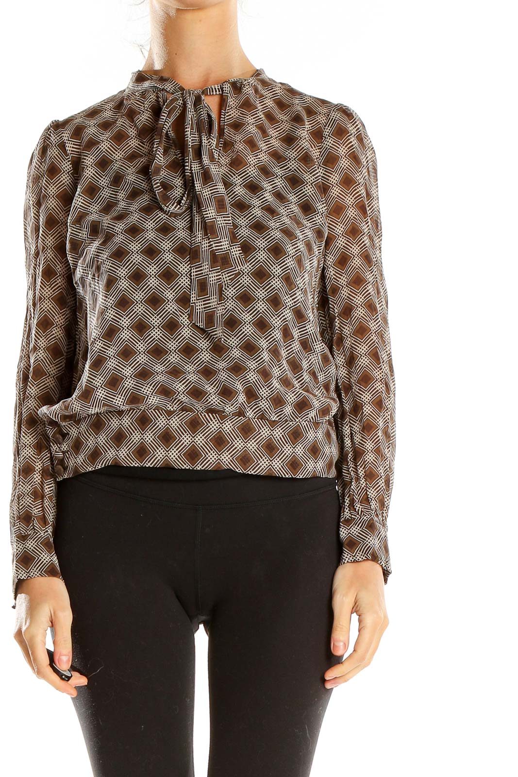 Front view of Fossil brown geometric print sheer blouse with gathered neckline