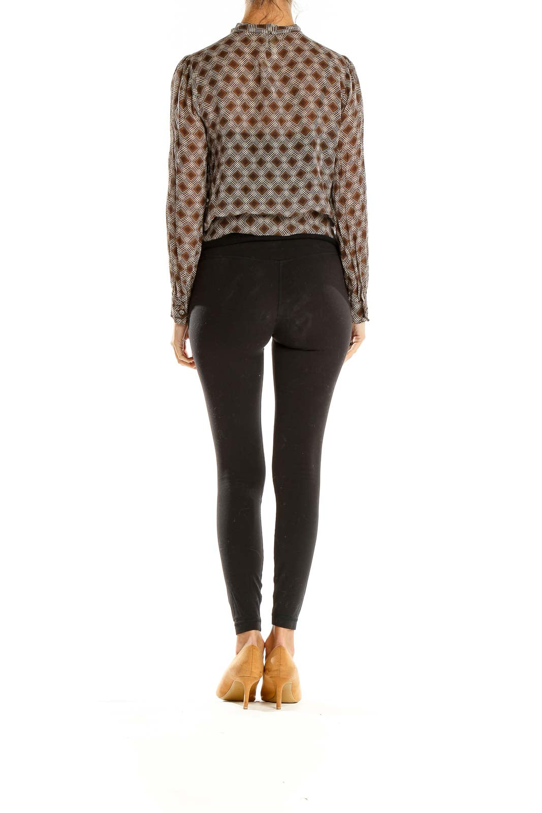 Side view of Fossil brown geometric print sheer blouse showing relaxed fit