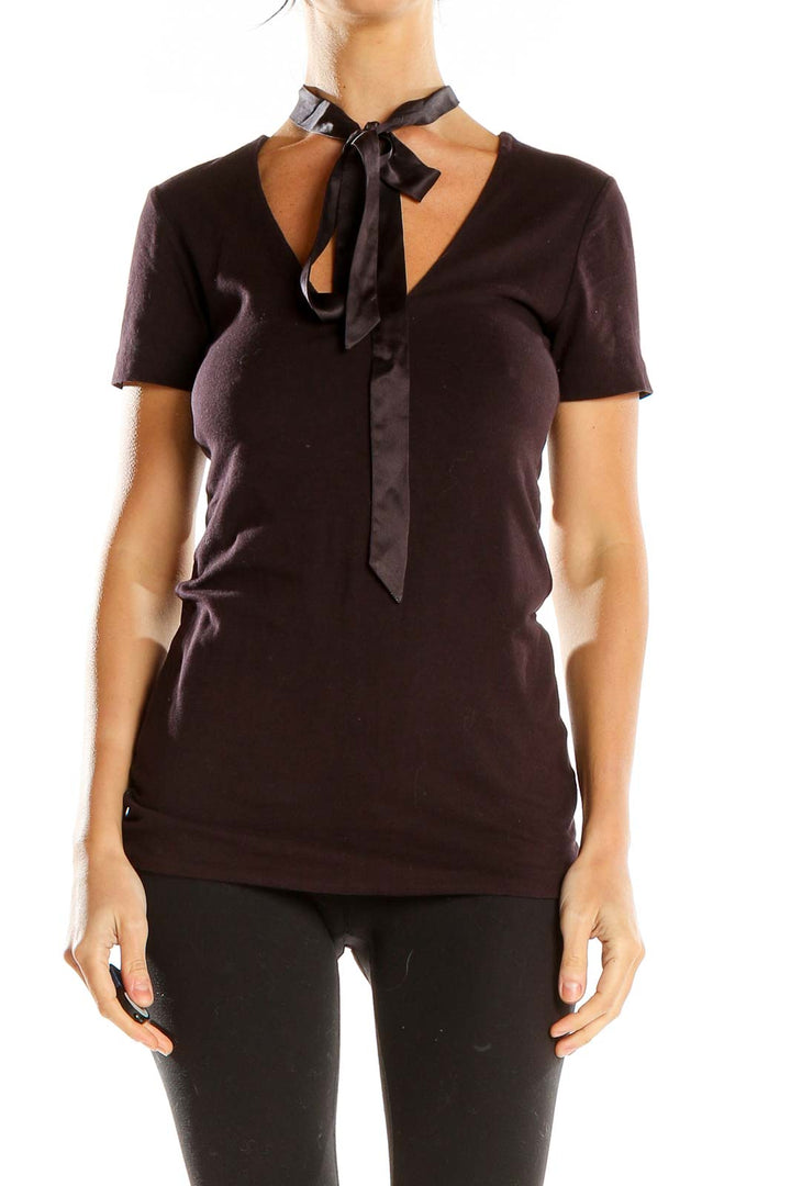Front view of brown Standard James Perse tie-neck short sleeve top