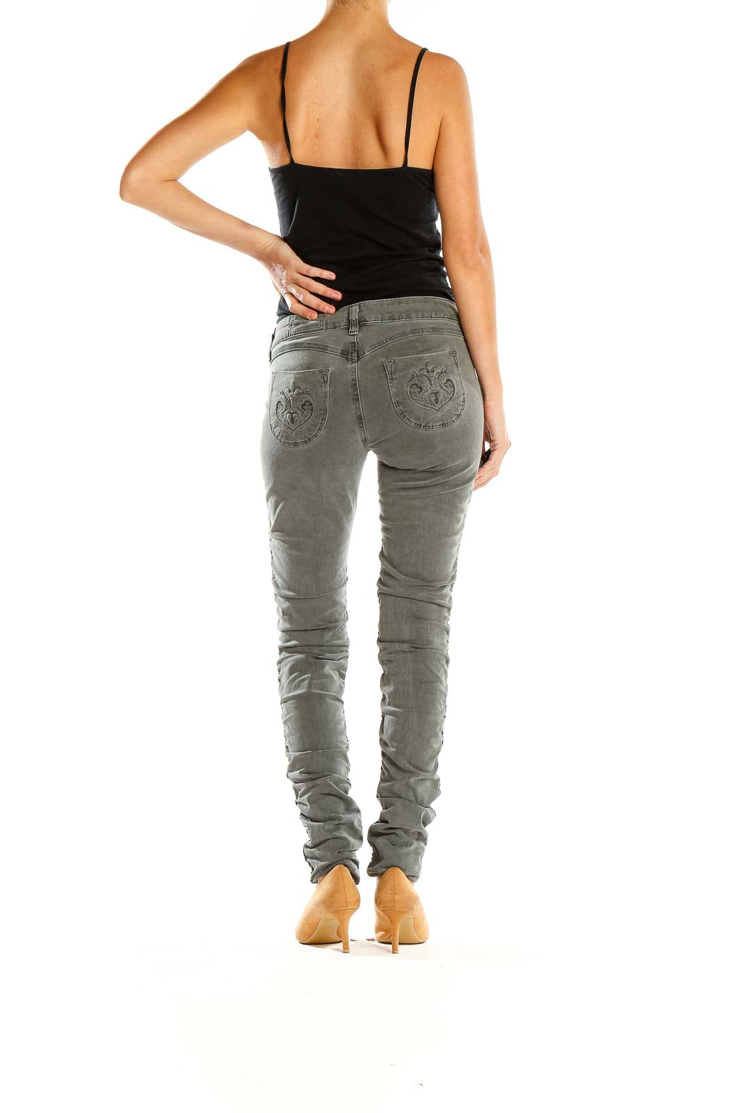 Side view of Siwy gray polka dot skinny jeans on model