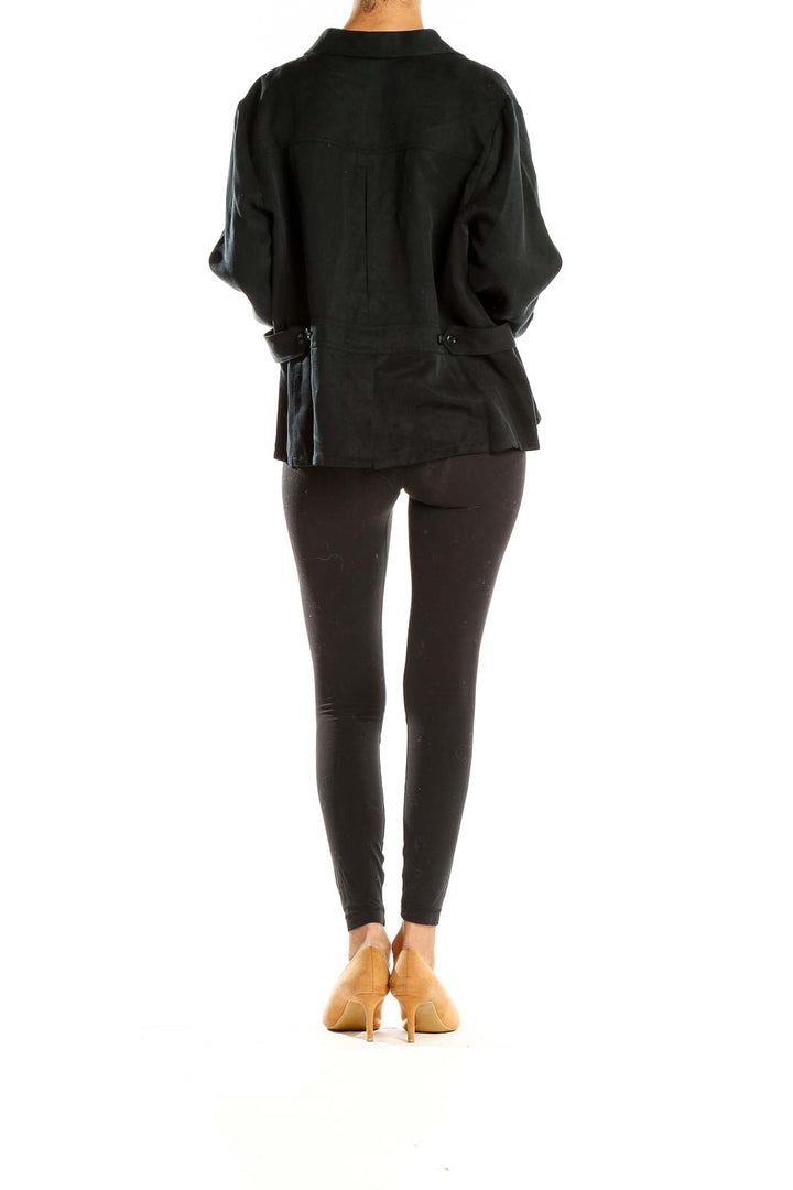 Back view of Pendleton black button-up shirt styled with black leggings