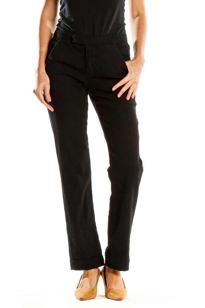 Front view of FRAME Denim black straight-leg pants on model