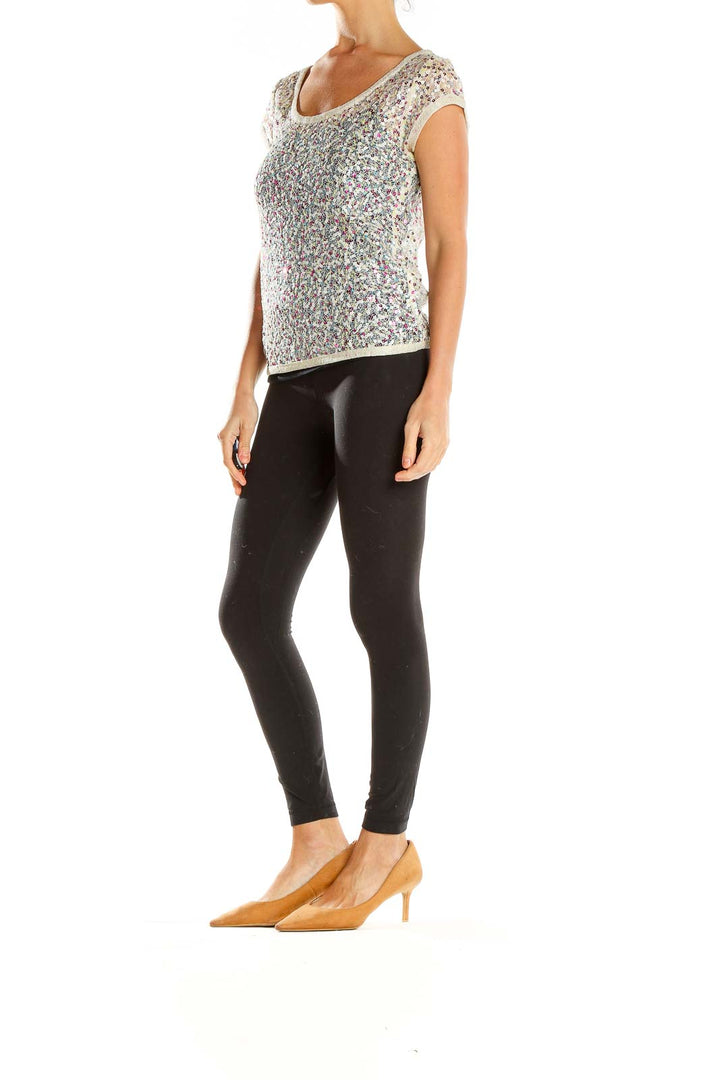 Front view of SilkRoll multicolor sequin cap sleeve top with scoop neckline
