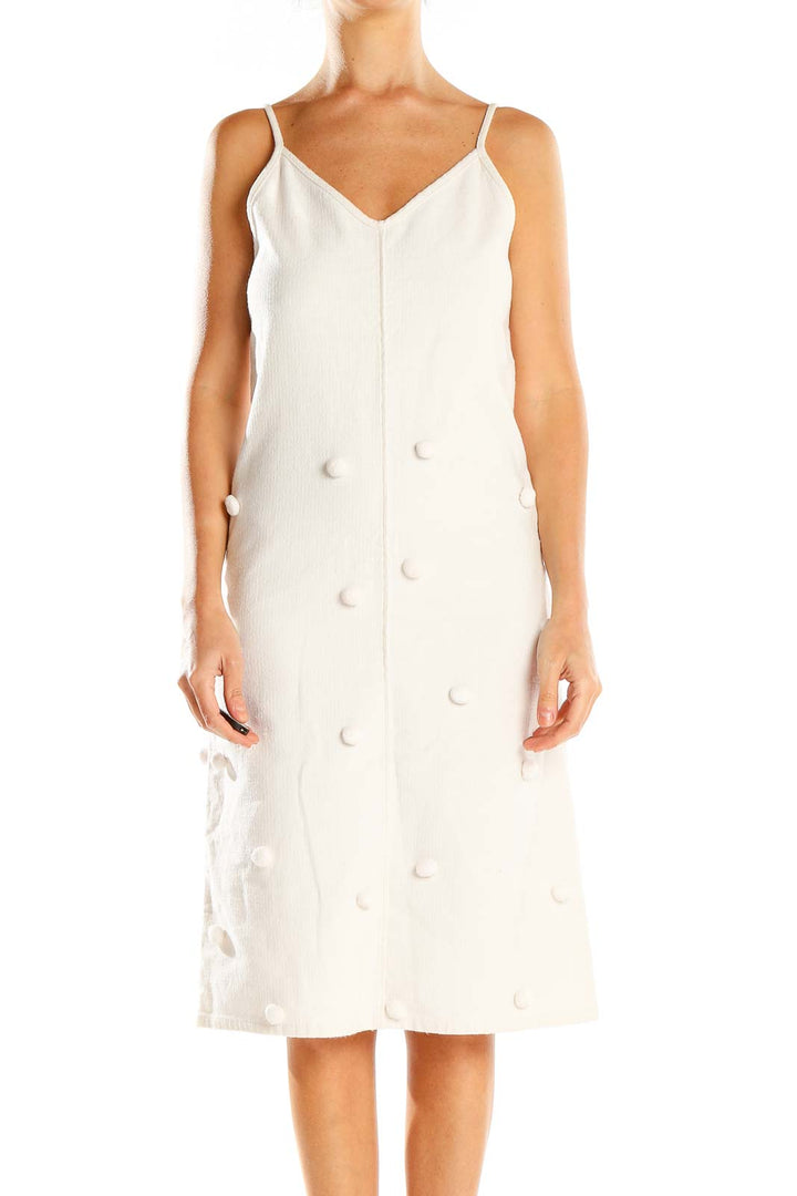 Front view of Apiece Apart white textured button-front midi dress with spaghetti straps