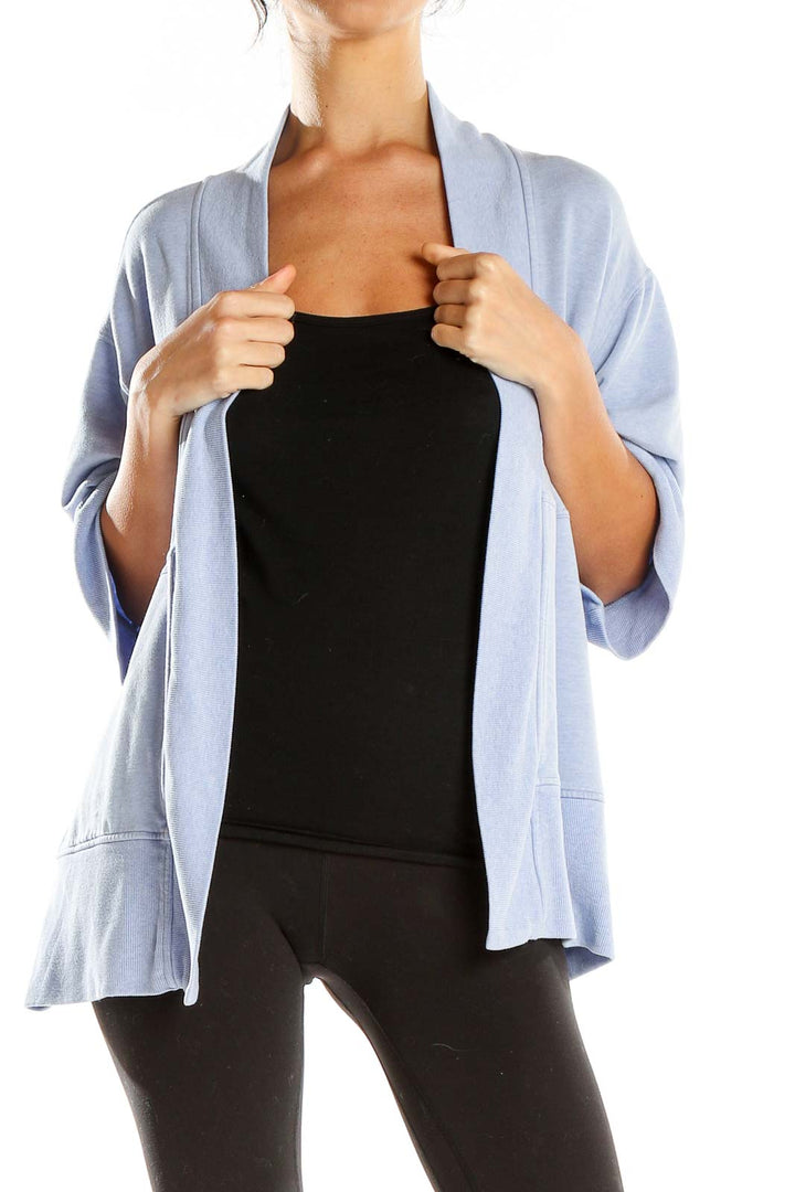 Front view of light blue Athleta relaxed fit cardigan with open front design