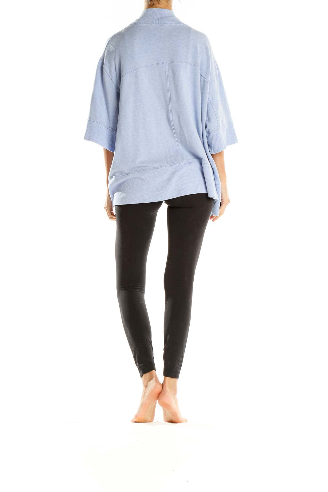 Back view of light blue Athleta relaxed fit cardigan showing 3/4 length sleeves