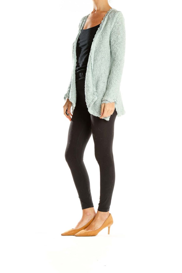 Front view of mint green Zara Knit open front cardigan with scalloped edges