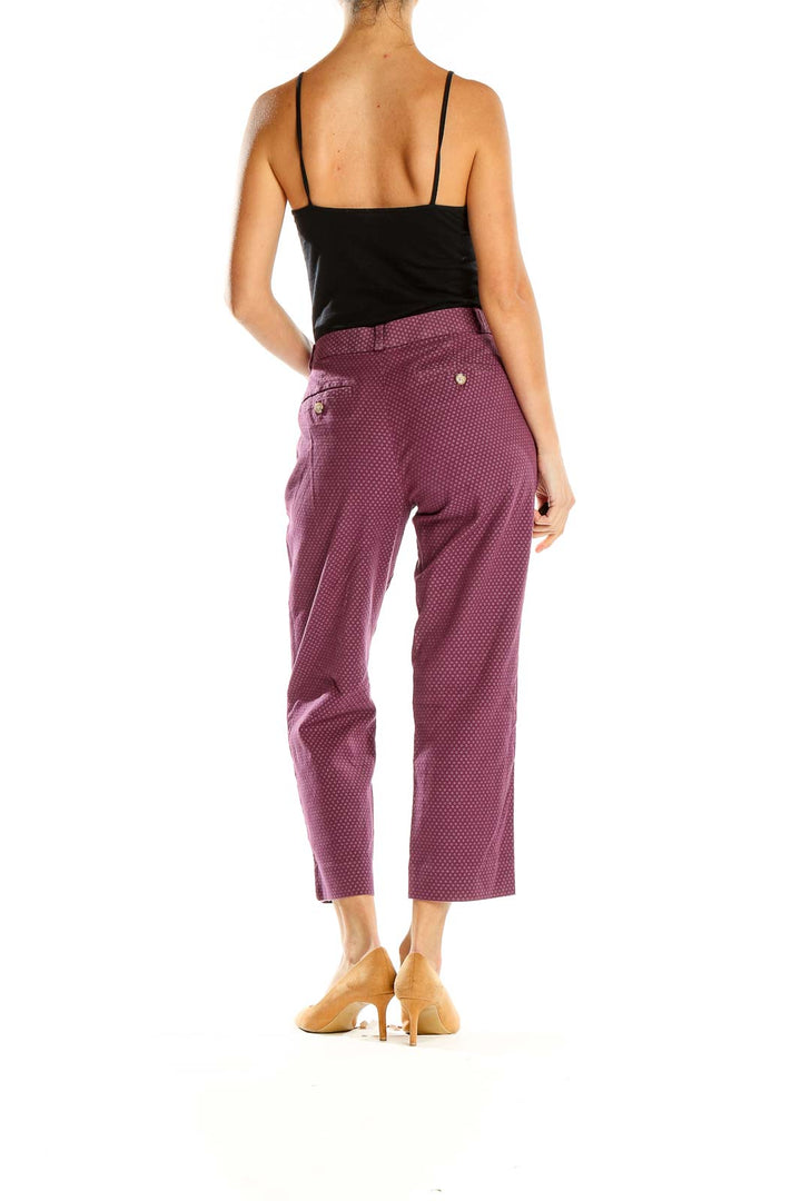 Side view of Banana Republic burgundy polka dot cropped trousers on model