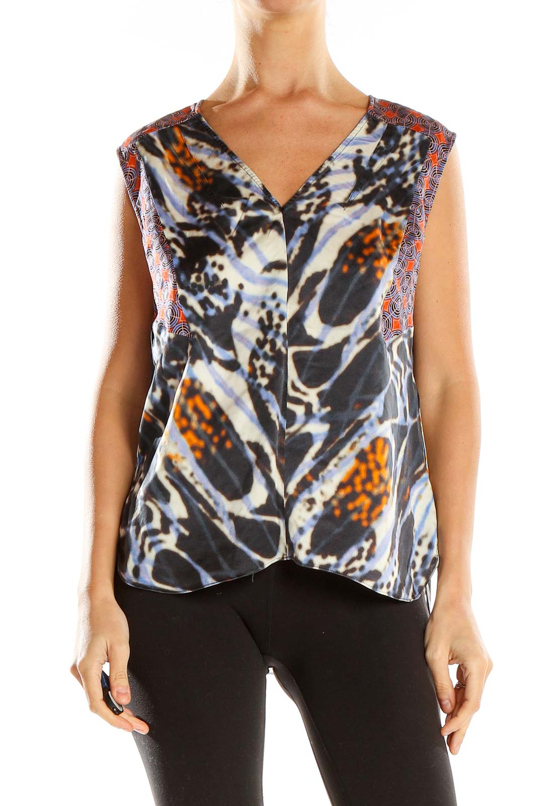 Front view of Rachel Roy abstract print silk top in black, white, and orange