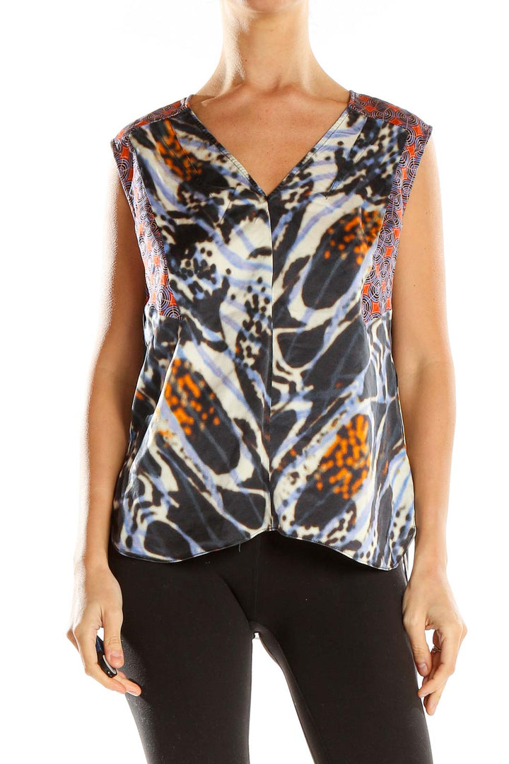 Front view of Rachel Roy abstract print silk top in black, white, and orange