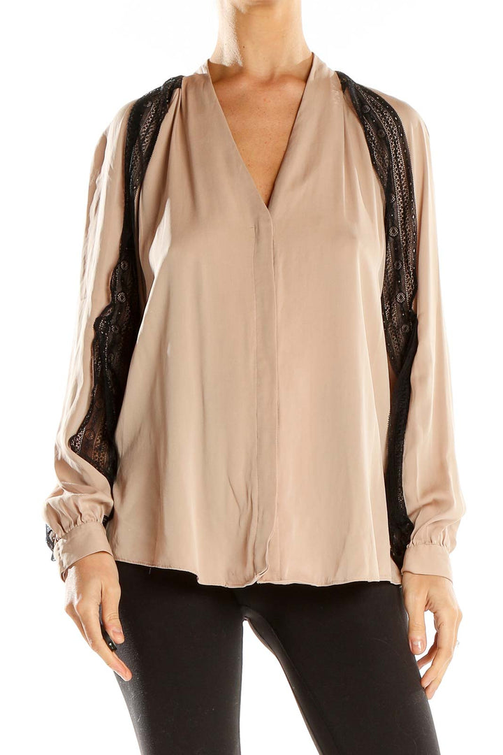 Front view of Kobi Halperin beige blouse with black lace trim and V-neckline