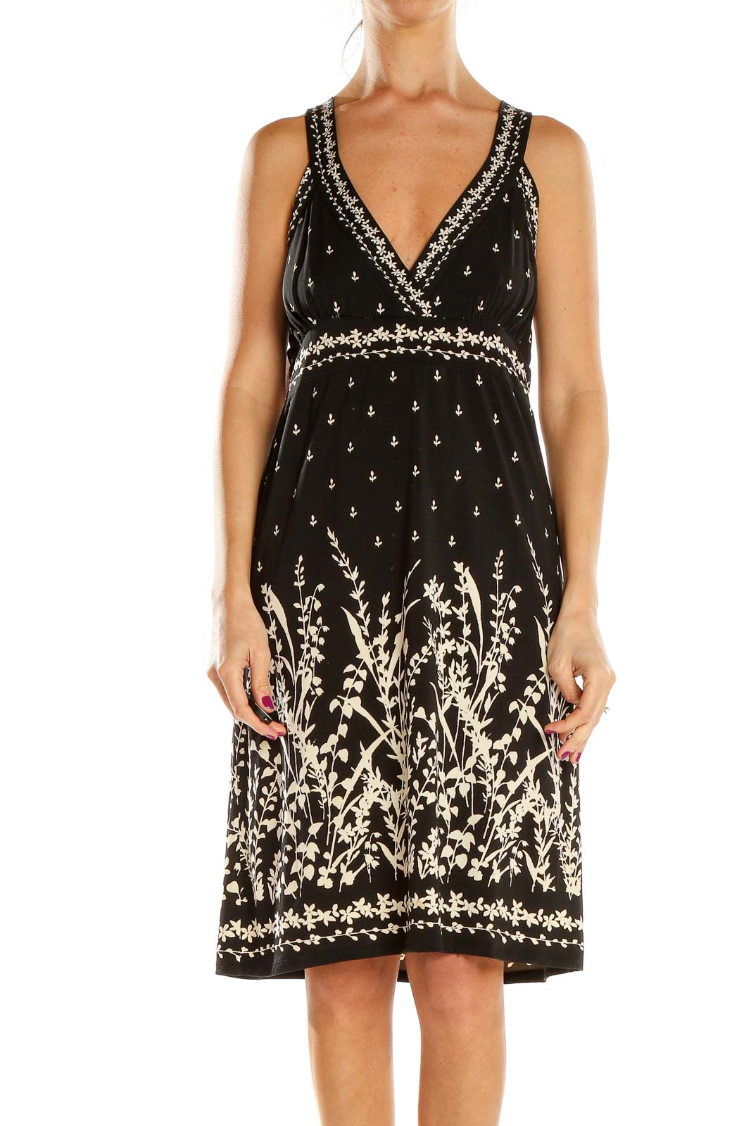 Front view of Max Studio black dress with floral embroidery and beaded v-neckline
