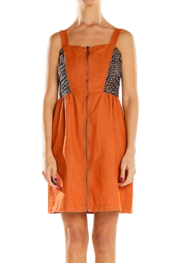 Front view of orange THML sundress with floral print bodice and front zipper