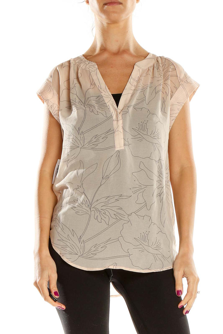 Front view of beige floral print V-neck blouse from BANANA REPUBLIC heritage