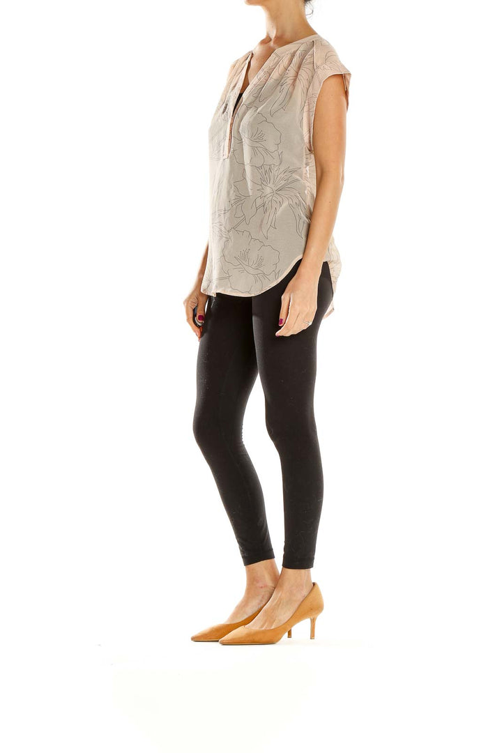 Front view of beige floral print V-neck blouse from BANANA REPUBLIC heritage