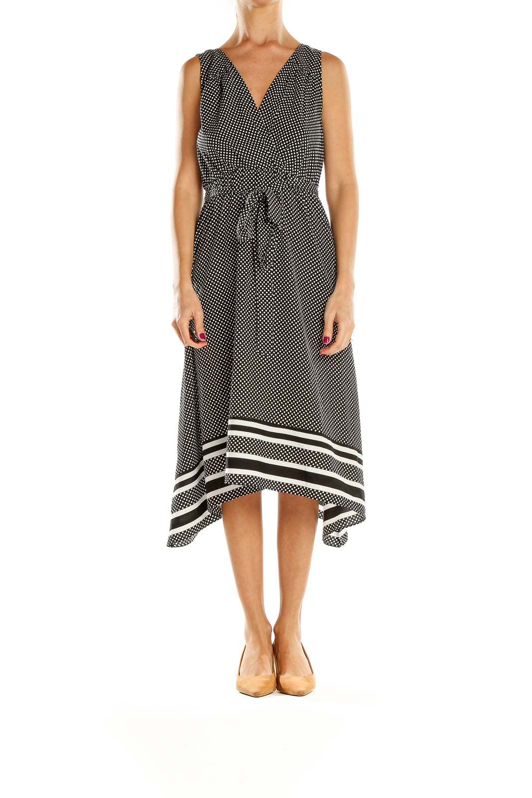 Front view of black and white polka dot maternity midi dress with V-neck and wrap bodice