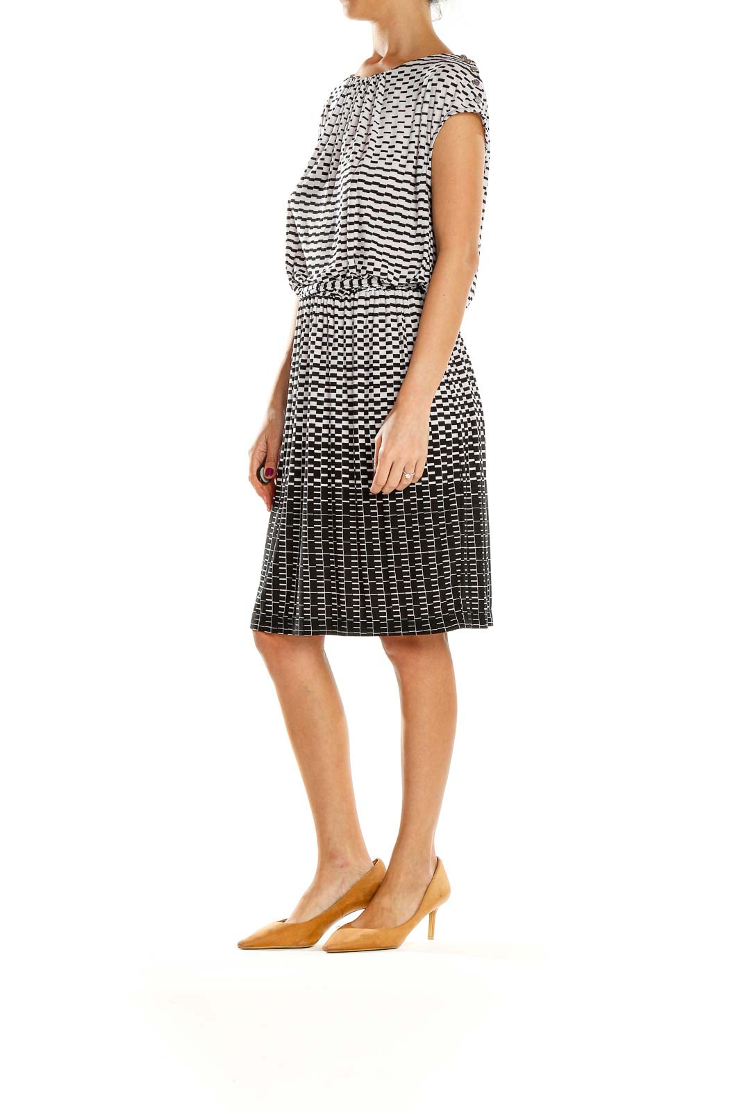 Front view of Guess black and white geometric print dress with gathered neckline