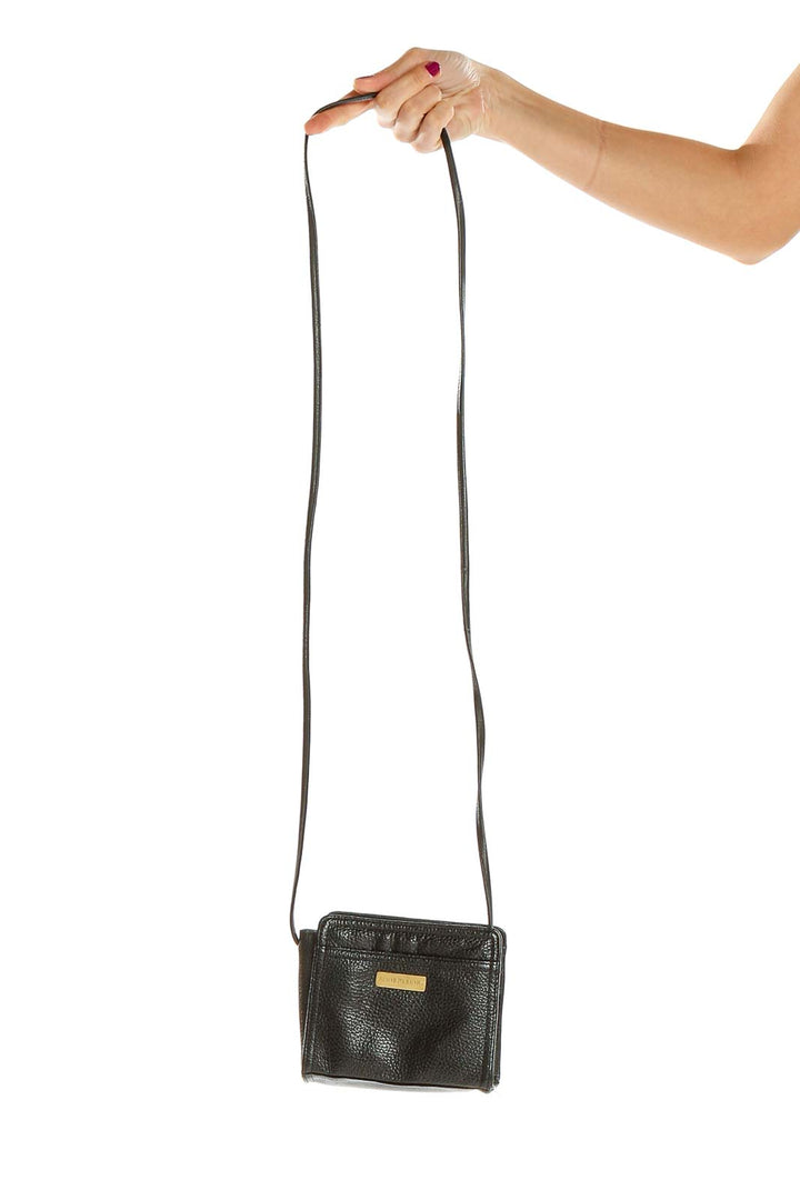 Front view of Anne Klein II black leather crossbody bag with gold-tone hardware