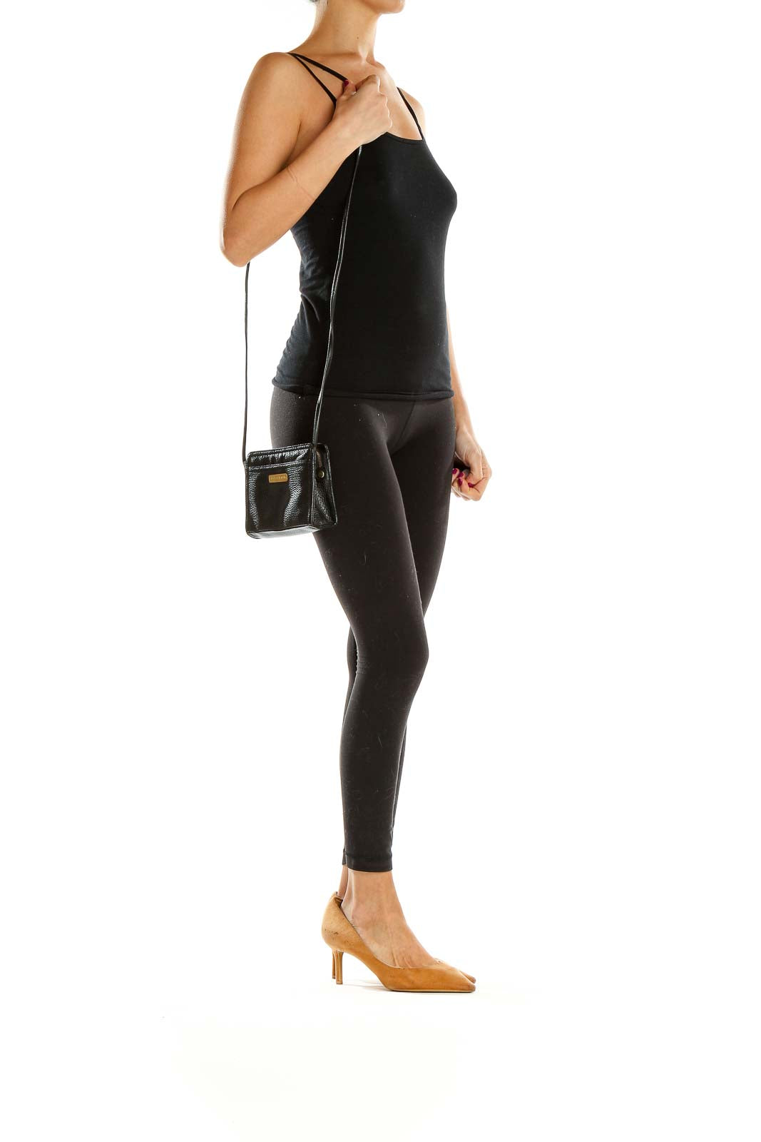 Front view of Anne Klein II black leather crossbody bag with gold-tone hardware