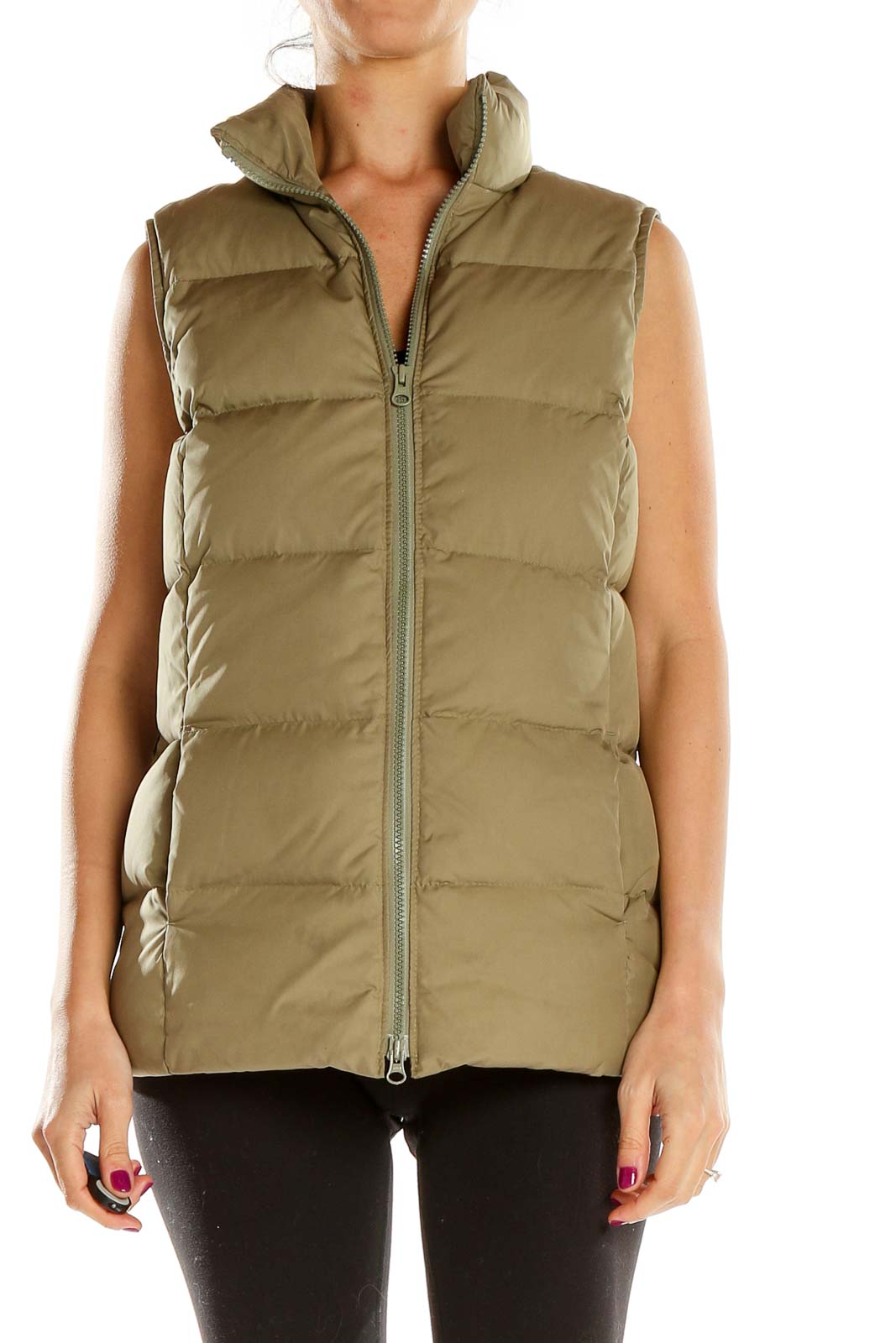 Front view of olive Gap quilted puffer vest on model