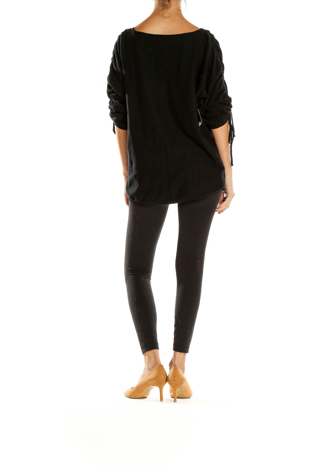 Side view of Max Studio black oversized knit sweater showing relaxed fit