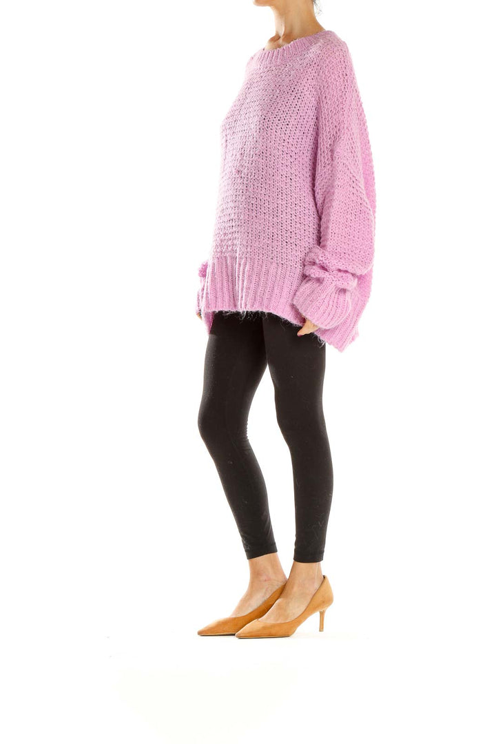 Front view of pink oversized chunky knit sweater by Chelsea28