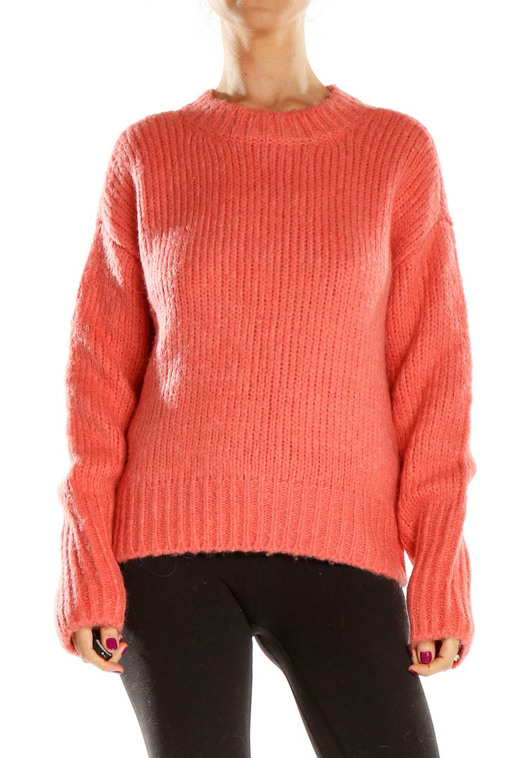 Front view of coral chunky knit sweater by Sanctuary