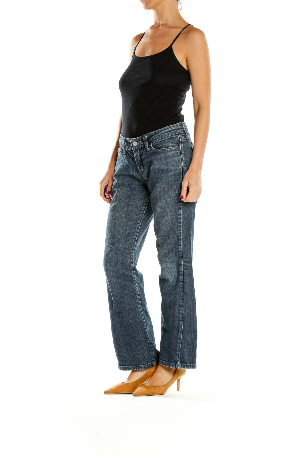 Front view of Levi's blue bootcut jeans on model