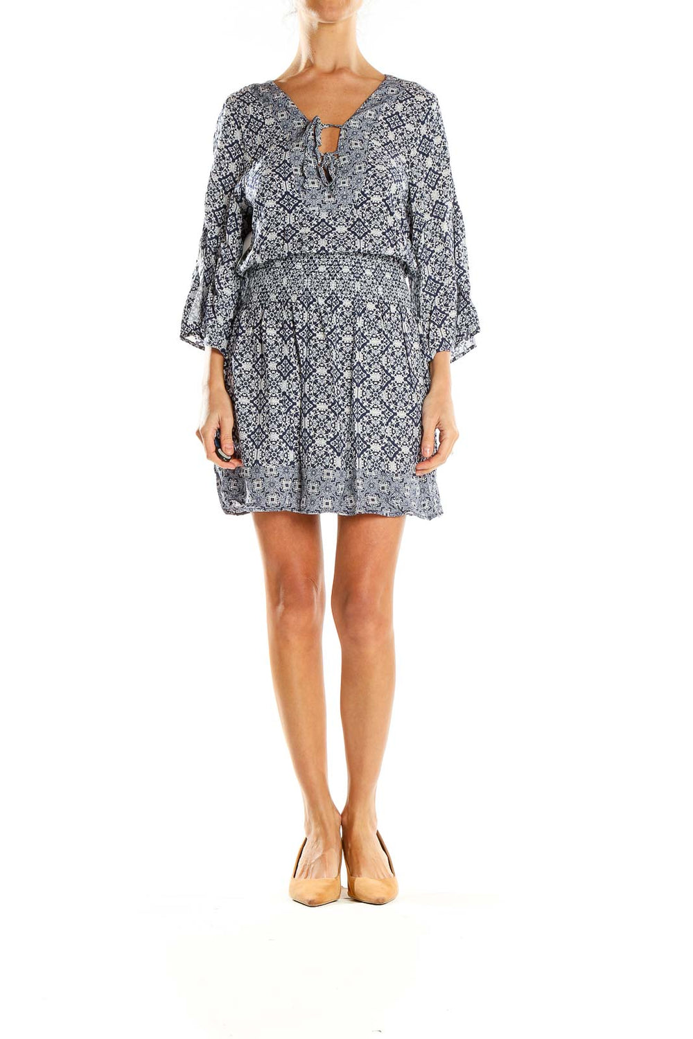 Front view of navy floral print mini dress with bell sleeves by JACK by BB Dakota