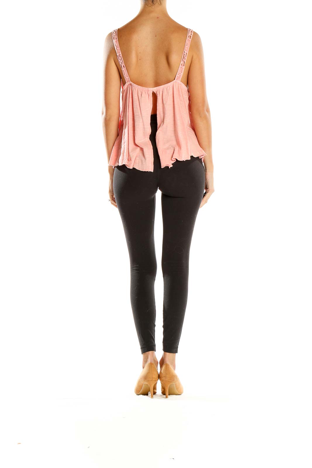 Side view of pink lace-trimmed tiered tank top by Kimchi Blue with black leggings