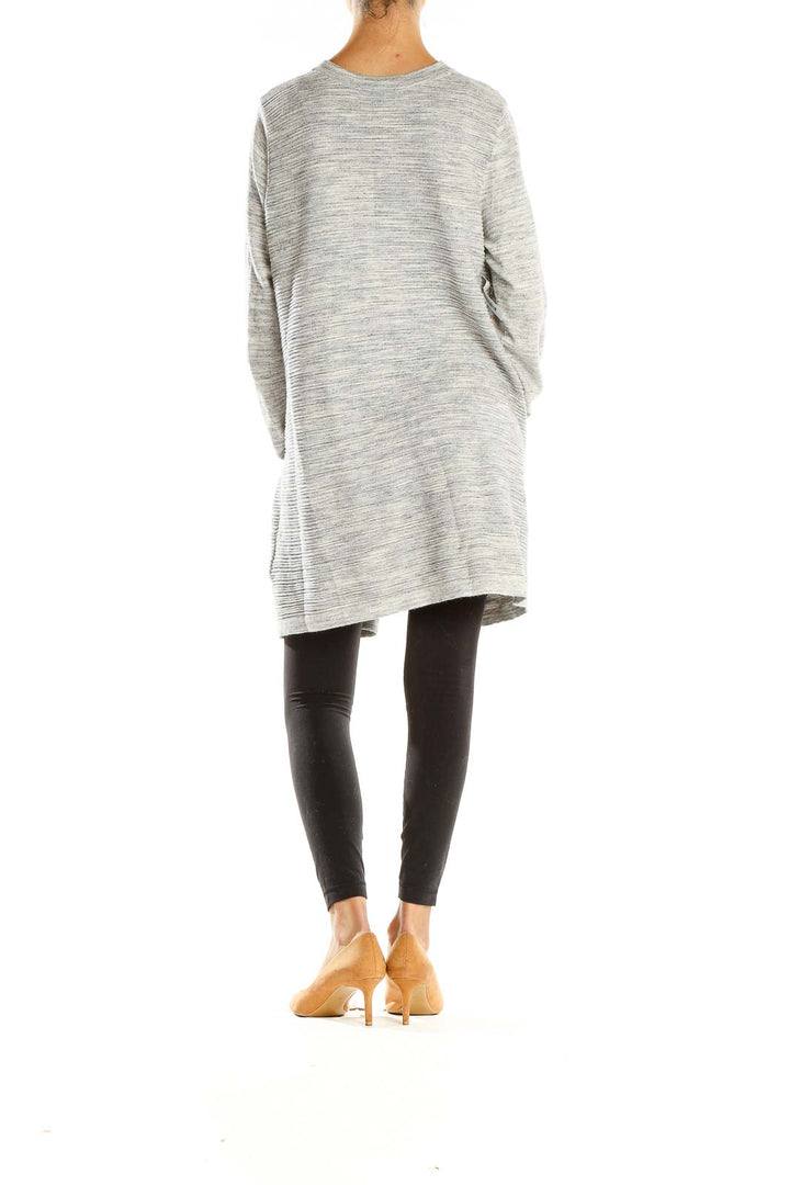 Side view of Tribal gray long open front cardigan on model with black outfit