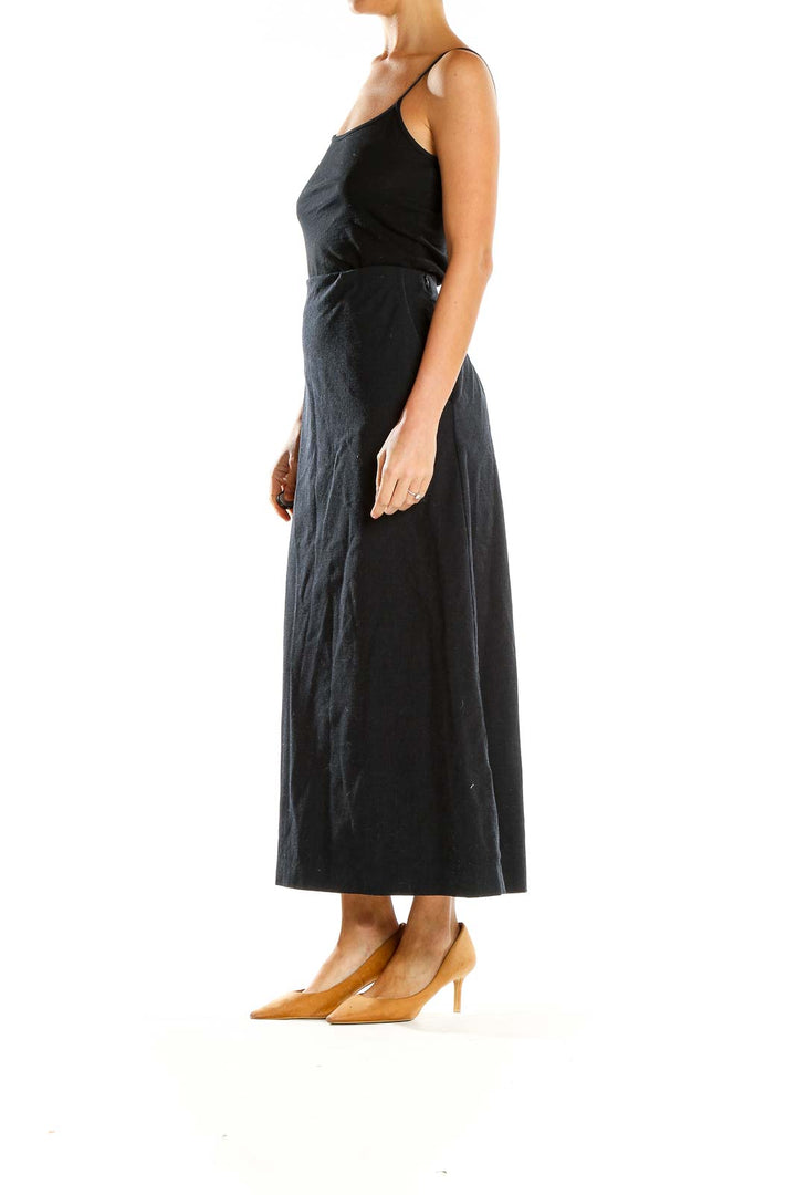 Front view of Banana Republic black A-line midi skirt on model