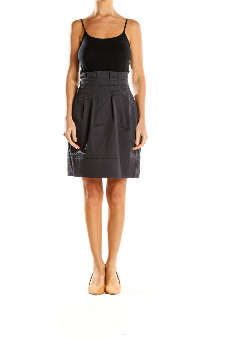 Front view of BCBG MaxAzria black pleated high-waist midi skirt