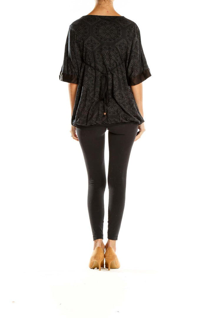 Side view of Ella Moss Black Geometric Print Empire Waist Top showing kimono sleeves
