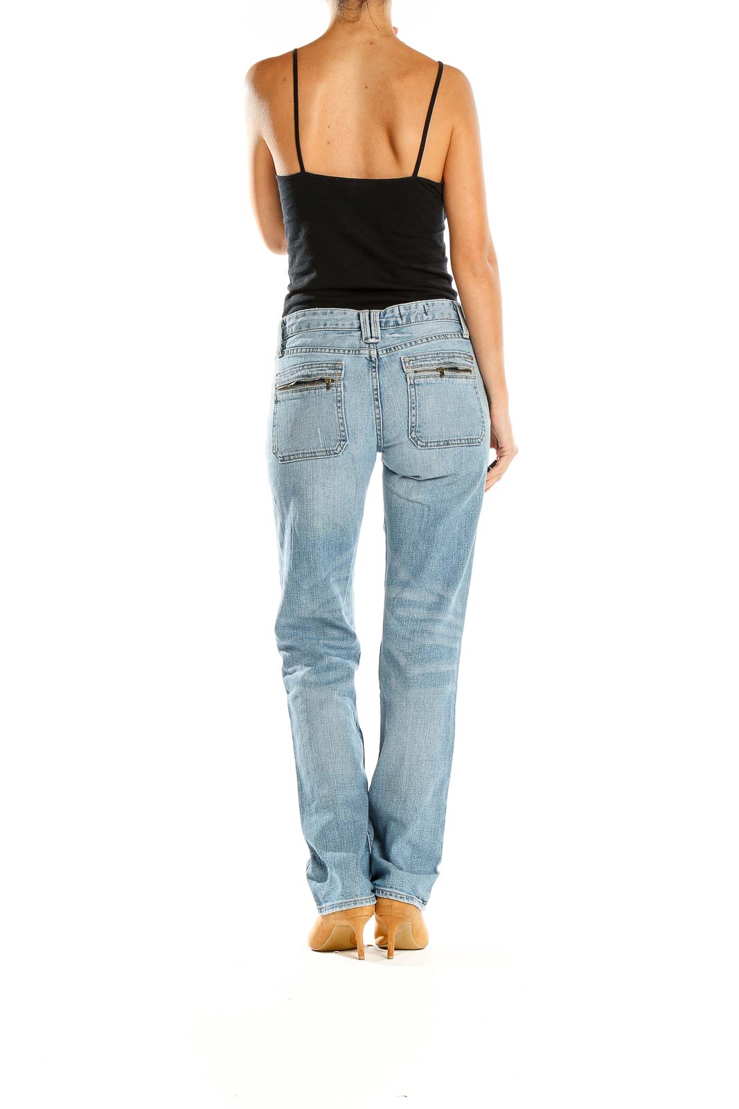 Side view of Gap light blue straight leg jeans on model