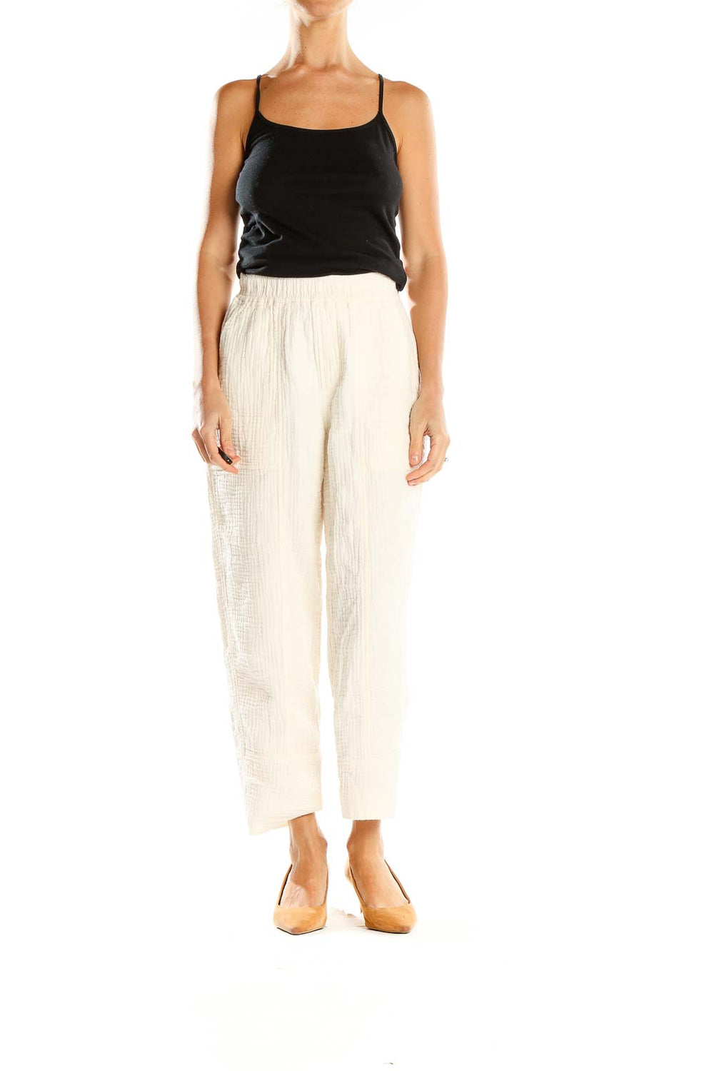 Front view of Madewell cream textured wide-leg pants on model
