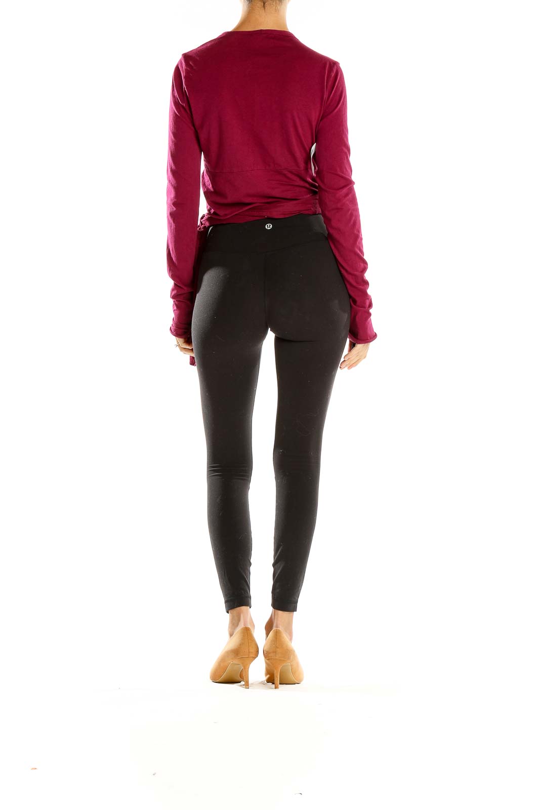 Side view of burgundy wrap-style cotton top by Velvet by Graham & Spencer with black leggings