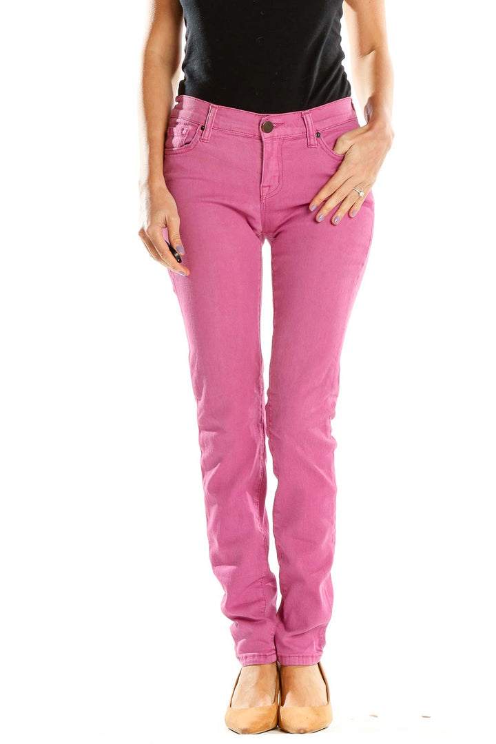 Front view of BDG pink slim-fit denim jeans on model