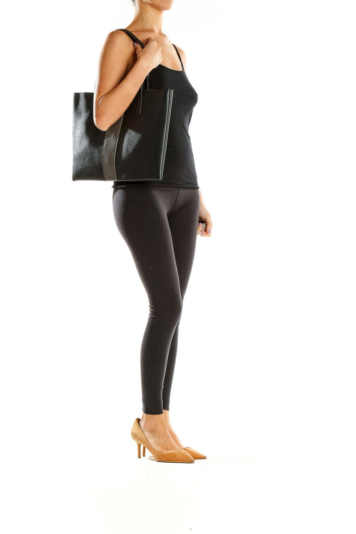 Front view of Vince Camuto black leather tote bag with gray contrast stripe