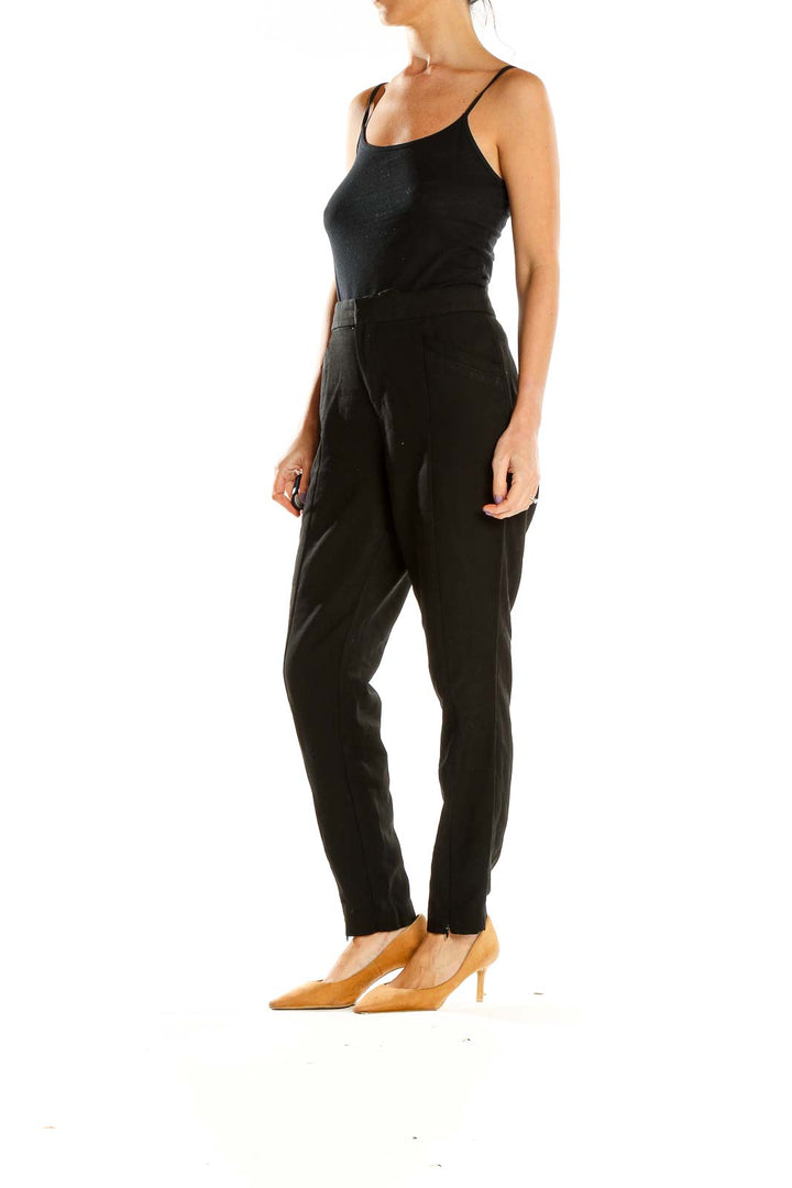 Front view of Gap black straight-leg trousers on model