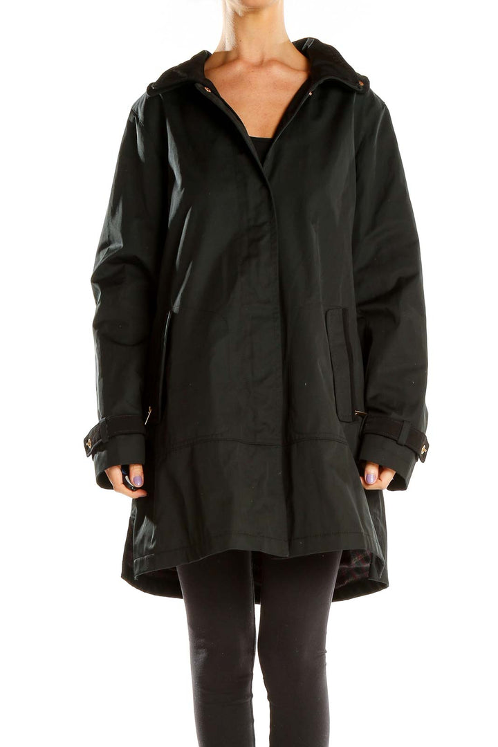 Front view of Jones New York black hooded trench coat on model