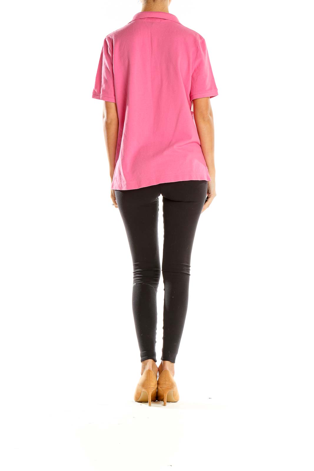 Side view of pink Lauren Ralph Lauren polo shirt on model with black pants