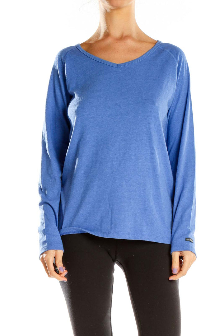 Front view of Columbia blue long sleeve V-neck athletic top