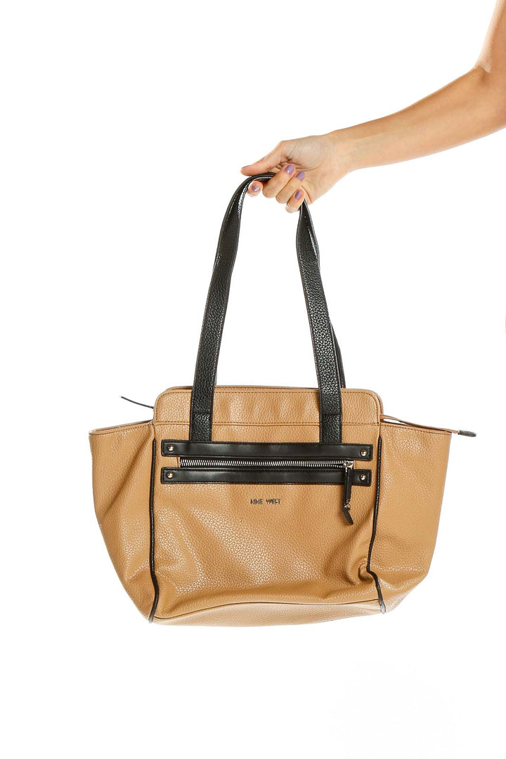 Front view of Nine West tan leather tote bag with black handles and trim
