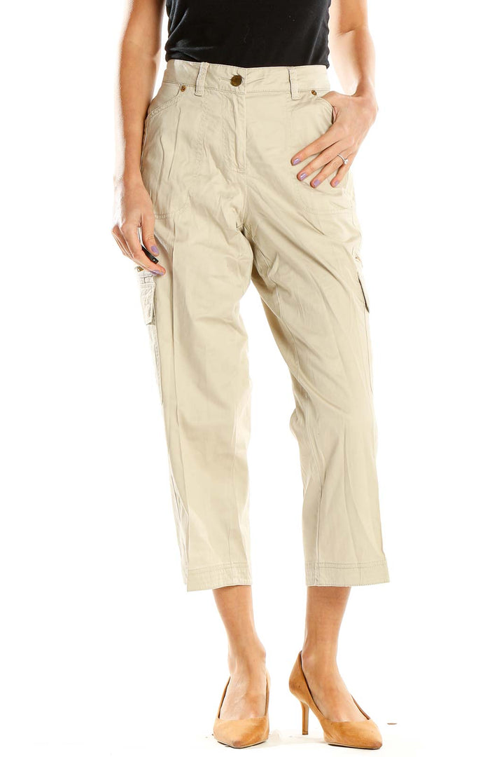 Front view of Cache beige cropped cargo pants on model